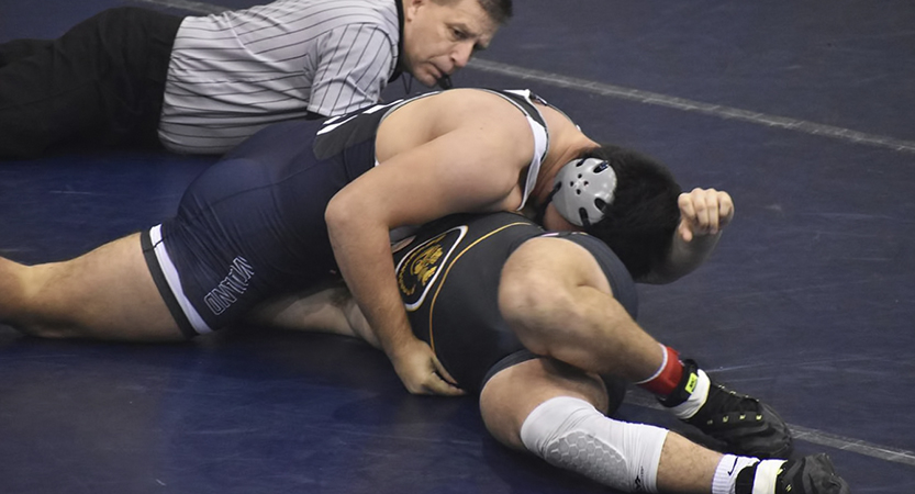 You are currently viewing Woodland dominates region duals, pinning 13 of 14 finals matches
